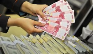 Rupiah Menguat Tipis di Awal Pekan Meski Terdampak Sentimen Risiko dari AS dan Tiongkok